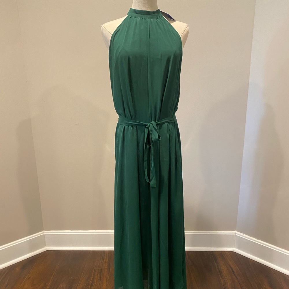 Green, chiffon like fabric, halter dress. Tea length, key hole back closure.